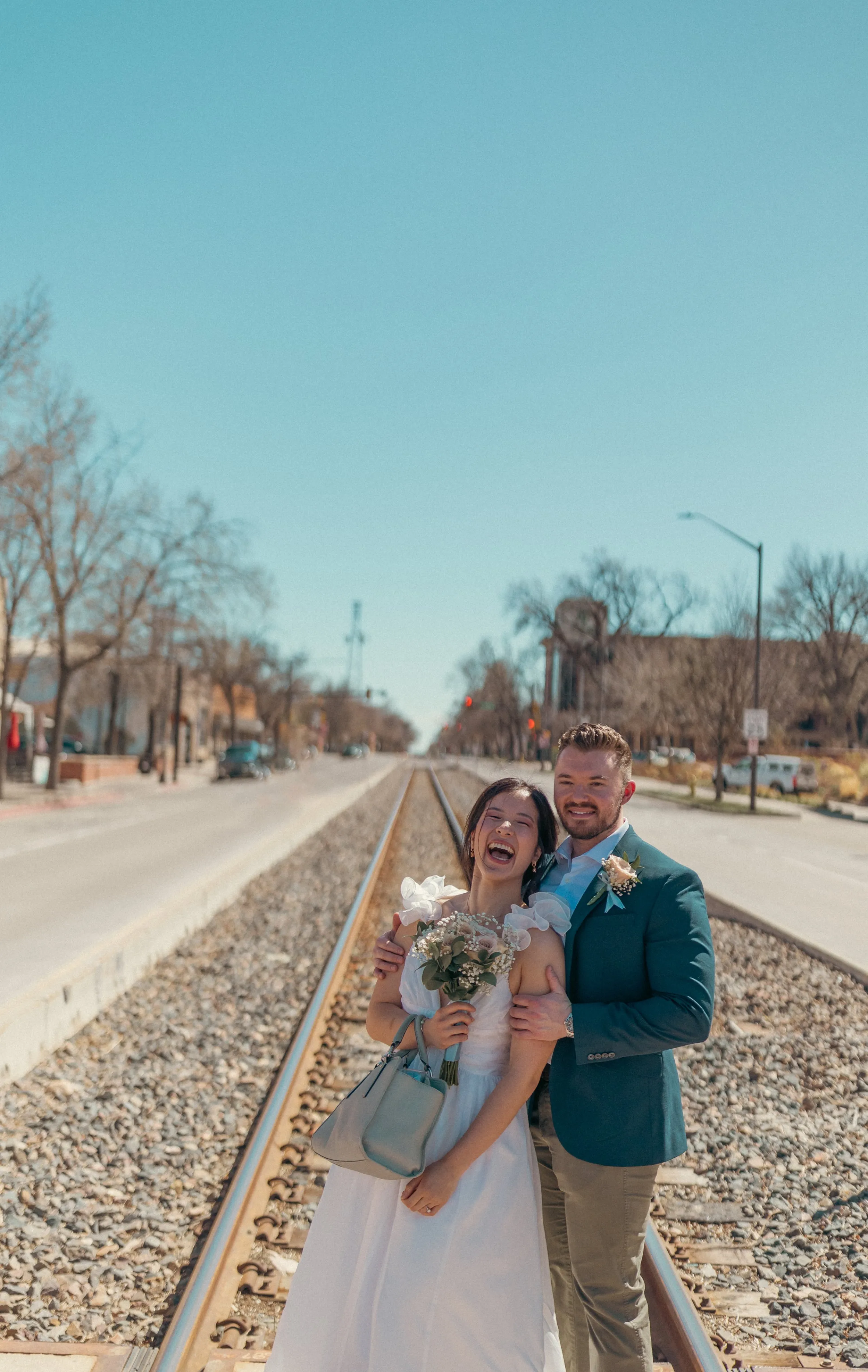 Newlyweds laughing together