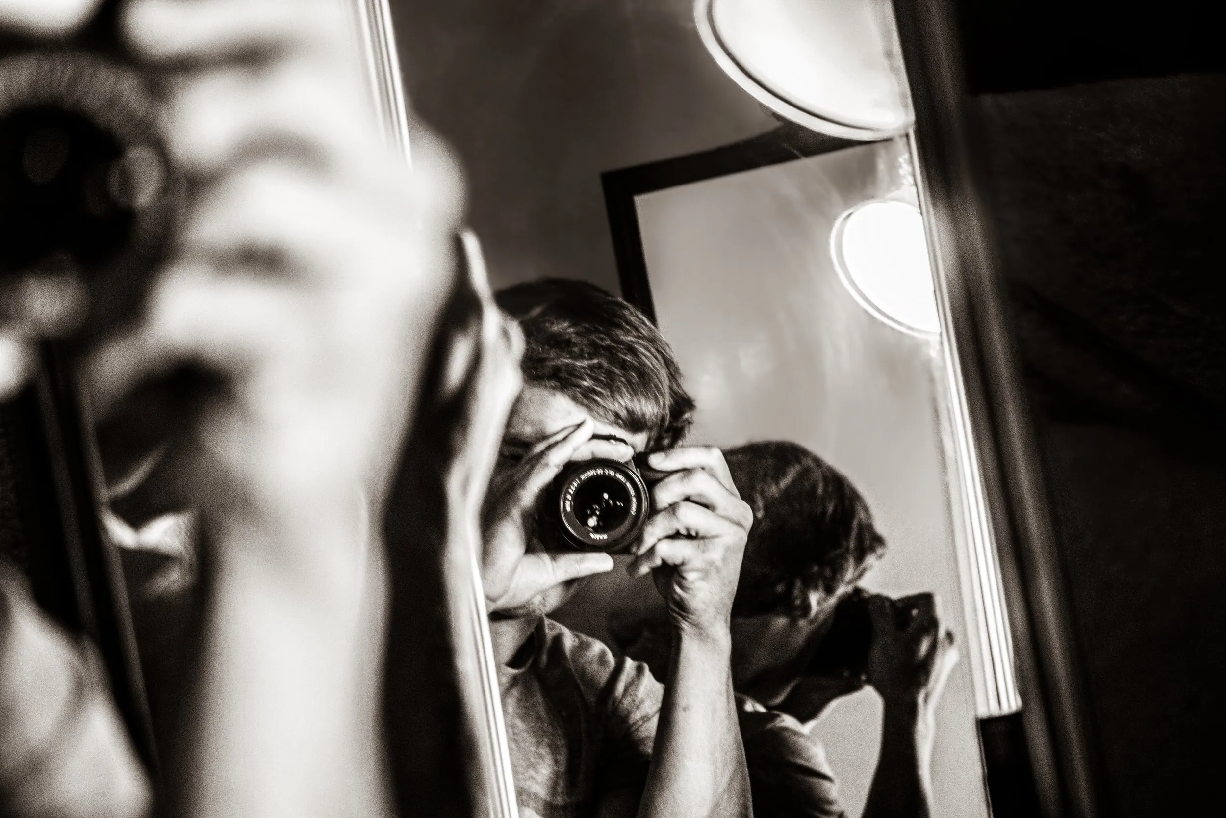Christian photographing his reflection in a mirror