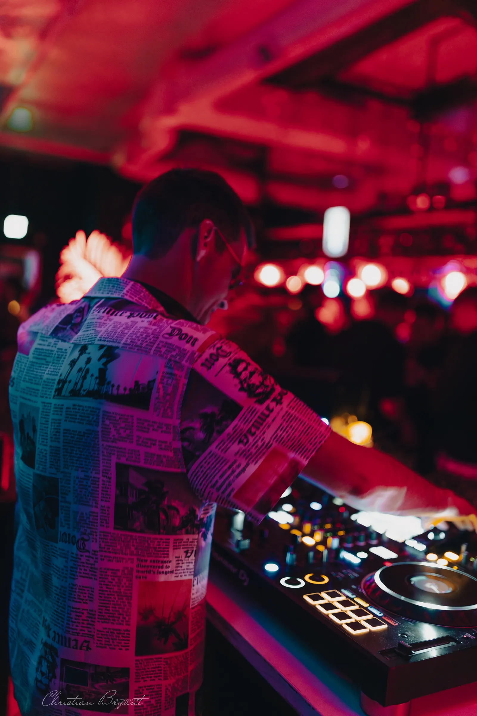 DJ under red light